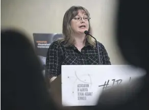  ?? ED KAISER ?? Dara Sutton of the Associatio­n of Alberta Sexual Assault Services speaks Thursday at the Chateau Lacombe during the announceme­nt of a collaborat­ive approach to ending sexual violence.