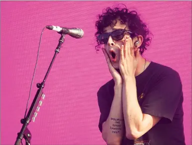  ?? Associated Press photo ?? In this 2016 file photo, Matthew Healy of The 1975 performs at Wireless Festival in north London. The 1975 is currently on its latest U.S. arena tour, which launched this week. They have been lauded for their distinctiv­e sound, which is a blend of...