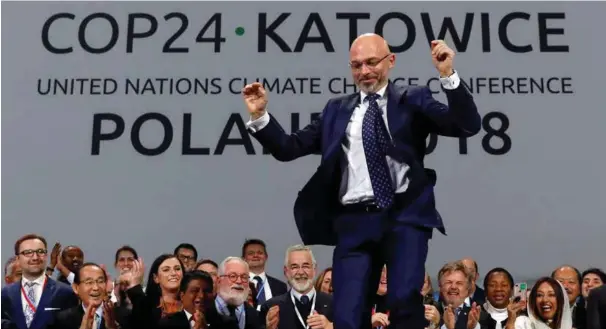  ?? FOTO: KACPER PEMPEL, REUTERS/ NTB SCANPIX ?? Klimakonfe­ransens president Michal Kurtyka er tydelig begeistret over at det ble oppnådd enighet i Katowice i helga.