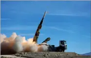  ?? IRANIAN ARMY AP PHOTO BY ?? In this photo provided Monday, Nov. 5, by the Iranian Army, a Sayyad 2 missile is fired by the Talash air defense system during drills in an undisclose­d location in Iran.