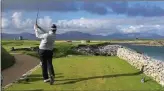  ??  ?? Shane Lowry tees off in Tralee