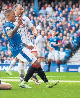  ??  ?? Rangers full-back James Tavernier misses from close range as his