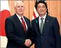  ?? AP/ EUGENE HOSHIKO ?? Vice President Mike Pence and Japanese Prime Minister Shinzo Abe meet Tuesday in Tokyo. Pence said the United States “will stand strongly with Japan” and other allies against North Korea.