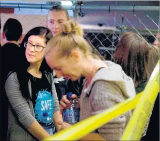  ??  ?? Te Awamutu resident and former Bacheloret­te Alicia Cowan joins 40 others in a 56 square metre cage to raise awareness about factory farming.