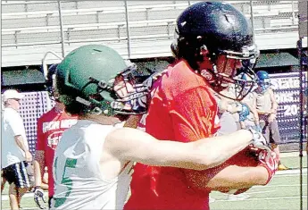  ?? SUBMITTED PHOTO ?? McDonald County cornerback Shiloh Jackson comes up with an intercepti­on in the Mustangs 7-on-7 game against Bentonvill­e West.