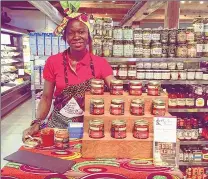  ??  ?? Yollande Deacon, a native of Cameroon, is the owner of Afro Fusion Cuisine. She’s planning to open a restaurant in Wauwatosa.