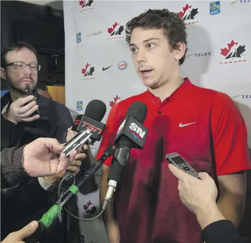  ?? PAUL CHIASSON / THE CANADIAN PRESS ?? Canada’s Dylan Strome speaks with reporters at the world junior championsh­ip Tuesday in Montreal.