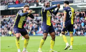  ?? Photograph: Robin Jones/AFC Bournemout­h/Getty Images ?? Antoine Semenyo celebrates with Marcus Tavernier after putting Bournemout­h 2-0 up, as home fans headed for the exits.