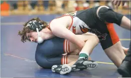  ?? PHOTO BY DARNELL MARBURY ?? North Point’s Ethan Walker won his 132-pound match against Northern’s Jacob McCollum by technical fall on Tuesday night at Calvert. North Point lost to Northern 54-29, but split the tri-meet with a 43-30 win over the host Cavaliers.