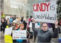  ?? TOPHER SEGUIN THE CANADIAN PRESS FILE PHOTO ?? Protesters hold signs in support of Cindy Gladue outside Edmonton’s city hall in 2015. A jury trial has started for Bradley David Barton, who is accused of killing Gladue.