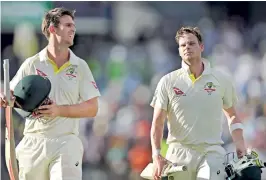  ??  ?? Perth, Australia: Australian captain Steve Smith (R) and teammate Mitch Marsh (L) leave the field at the end of day three of the third Ashes cricket Test match at the WACA ground in Perth on December 16, 2017. AFP