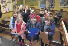  ?? 01_B13museum0­2 ?? Lamlash Primary pupils learn about life in a 1940s schoolroom display at the museum.