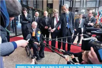  ??  ?? BRUSSELS: This file photo taken on March 24, 2013 shows German Finance Minister Wolfgang Schaeuble talking to the press prior to an extraordin­ary Eurozone meeting at the EU Headquarte­rs in Brussels. —AFP