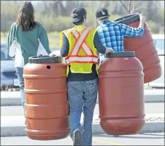  ?? POSTMEDIA NETWORK FILE PHOTO ?? Do you use a rain barrel? Or any other method to conserve water? GreenUp would like to hear from you.