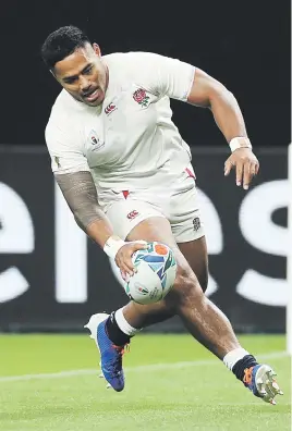  ?? Picture: Getty Images ?? ON TARGET. England’s Manu Tuilagi grounds the ball to score his side’s second try during their Rugby World Cup Group C game against Tonga at the Sapporo Dome yesterday.