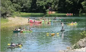  ?? MEGAN DAVIS/MCDONALD COUNTY PRESS ?? Floaters took to the Elk River in a variety of vessels this Memorial Day Weekend 2016 — canoes, kayaks, rafts, inner tubes, and paddleboar­ds to name a few.