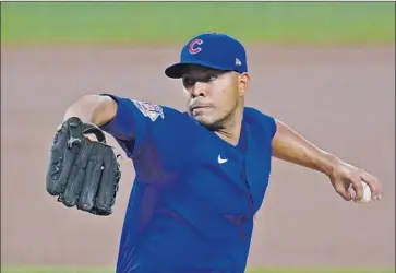 ?? Gene J. Puskar Associated Press ?? AFTER A KITCHEN ACCIDENT, José Quintana made only four appearance­s for the Chicago Cubs in 2020. Quintana, who had been one of baseball’s most durable pitchers, hopes to get back on track with the Angels.