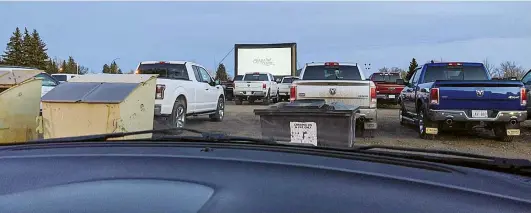  ?? SUBMITTED PHOTO ROSALEE ANDERSON ?? Moviegoers kept their distance by staying in their cars Saturday night in Redcliff, where a drive-in movie night attracted more than 400 vehicles.