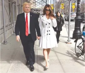  ?? (Courtesy of Tzur) ?? ISRAELI MODEL Mira Tzur works as a Melania Trump impersonat­or alongside John Di Domenico.