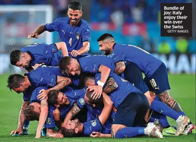  ?? GETTY IMAGES ?? Bundle of joy: Italy enjoy their win over the Swiss