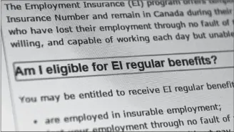  ?? CP FILE PHOTO ?? Canada Service centre documents that display Employment Insurance options are pictured in Ottawa in 2015.