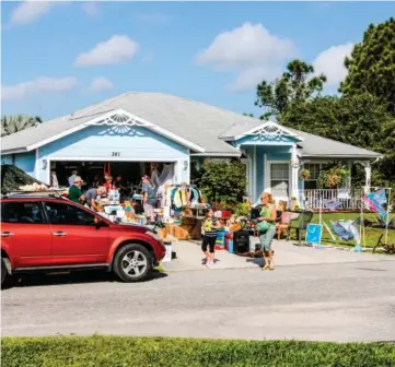  ??  ?? Donating or selling unused items is a great way to reduce clutter in a garage, and seldom-used items can be moved to a storage building.