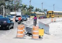  ?? MIKE STOCKER/ STAFF PHOTOGRAPH­ER ?? An estimated 157,000 vehicles travel Broward Boulevard between Federal Highway and I-95 every day, according to state statistics.