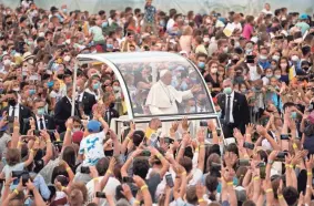  ?? GREGORIO BORGIA/AP ?? People gather to see Pope Francis in Kosice, Slovakia, Tuesday.