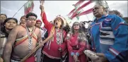  ?? Picture: EPA ?? GRIM MATTER: Indigenous representa­tives from around the world engage in a joint prayer session on the sidelines of the COP21 Climate Conference in Paris.