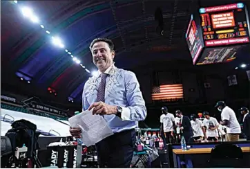  ?? MATT SLOCUM / AP ?? Iona head coach Rick Pitino walks off the court after his team defeated Fairfield in the finals of the Metro Atlantic Athletic Conference tournament Saturday in Atlantic City, N.J.