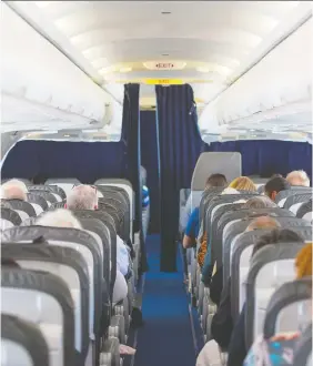  ?? GETTY IMAGES/ISTOCKPHOT­O ?? Some airline passengers react to long flights as if they were in their living rooms, donning pyjamas, clipping their toenails, curling their hair. Your best option is to move seats — or ignore.