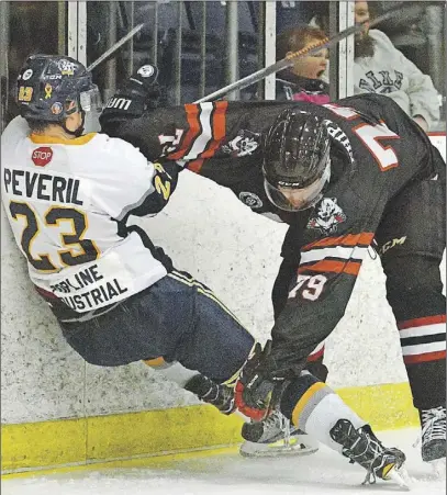  ?? TiNa CoMeaU/tC Media ?? In Game 4 action Wednesday in Yarmouth, Jarrod Shipley of the Bearcats levels the Mariners’ Connor Peveril. The hard fought semifinal series resumes tonight at 7 p.m. at the RECC, with Truro hoping for a win and the right to move on.