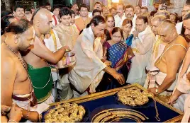  ??  ?? IN EXCESS: (Above) Telangana CM K. Chandrasek­har Rao offering gold ornaments worth 5.6 crore at Lord Venkateshw­ara Temple in Tirupati