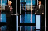  ?? AP/MATT FROST ?? Boris Johnson (left) and Jeremy Hunt, who are vying for leadership of Britain’s Conservati­ve Party, participat­e in Tuesday’s debate in Salford, England.