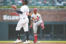  ?? BRETT DAVIS/USA TODAY ?? The Cards’ Kolten Wong reacts after driving in two runs in the first inning, when St. Louis cruised to a 10-0 lead en route to a 13-1 win over the Braves in Game 5 of their series Wednesday in Atlanta.