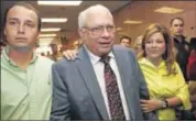 ?? AP ?? Robert Bates (center) leaves his arraignmen­t in Tulsa, Okla., on Tuesday. Bates, a reserve deputy, pleaded not guilty to a second-degree manslaught­er charge.