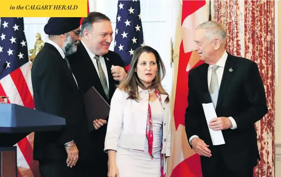  ?? MANUEL BALCE CENETA / THE ASSOCIATED PRESS ?? Defence Minister Harjit Sajjan, left, and Foreign Affairs Minister Chrystia Freeland leave a meeting with U.S. Defense Secretary Jim Mattis, right, and Secretary of State Mike Pompeo at the State Department in Washington on Friday, as the RCMP’s arrest of a Huawei executive at the U.S.’s behest was seen as sparking Chinese backlash at Canada.