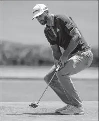  ?? AP PHOTO ?? Dustin Johnson reacts after missing a putt on the fifth green during the second round of the U.S. Open Golf Championsh­ip, Friday, in Southampto­n, N.Y.