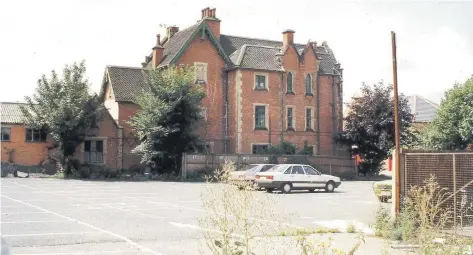  ??  ?? Pictured are the Tudor Mansions in Wood Gate in Loughborou­gh in the 90s before they were demolished for a multi-storey car park.
