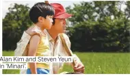  ??  ?? Alan Kim and Steven Yeun in ‘Minari’.