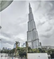  ?? Leslie Pableo for The National ?? Stormy skies above Dubai delayed flights from the city’s internatio­nal airport