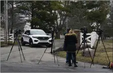  ?? AP PHOTO/MICHAEL CONROY ?? Police secure the entrance to the neighborho­od of former Vice President Mike Pence’s Indiana home, Friday, Feb. 10, 2023 in Carmel, Ind.