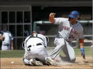  ?? CHARLES REX ARBOGAST - THE ASSOCIATED PRESS ?? New York Mets’ Robinson Cano (24) scores on a single by Wilson Ramos and a missed catch error by Chicago White Sox catcher Welington Castillo during the sixth inning of a baseball game Thursday, Aug. 1, 2019, in Chicago.