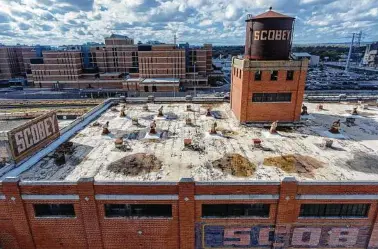  ?? William Luther / Staff photograph­er ?? The structures at the Scobey complex could become housing, offices and retail space.