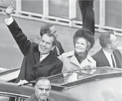  ?? AP FILE PHOTO ?? President Nixon and first lady Pat Nixon go from his inaugurati­on at the Capitol to the White House on Jan. 20, 1969.