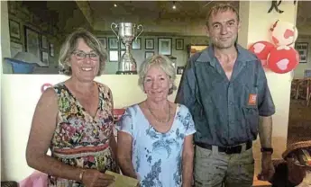  ??  ?? REASON TO CELEBRATE: The ladies’ section at the Royal Port Alfred Golf Club had both their centenary celebratio­ns and their open competitio­n recently, although their normal weekly Tuesday competitio­n was rained off. The winners of the BUCO Open Oceana prizes were, from left, Ingrid Moss, Jane Bladen and BUCO representa­tive and prize presenter Marius Schoeman