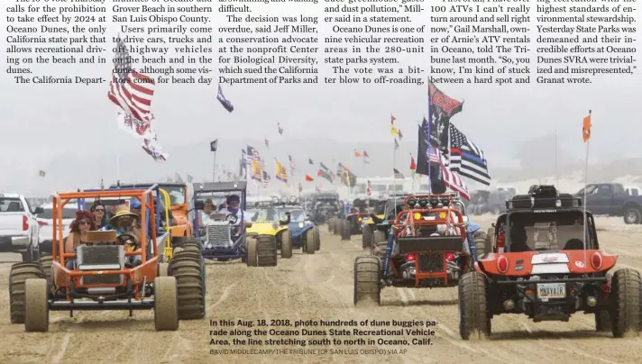  ?? DAVID MIDDLECAMP/THE TRIBUNE (OF SAN LUIS OBISPO) VIA AP ?? In this Aug. 18, 2018, photo hundreds of dune buggies parade along the Oceano Dunes State Recreation­al Vehicle Area, the line stretching south to north in Oceano, Calif.