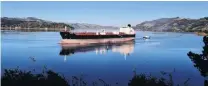  ?? PHOTO:PETER MCINTOSH ?? Fuel costs up. . .The fuel tanker MV Kokako passes Roseneath after delivering fuel to Dunedin’s upper harbour, in June.
