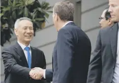  ??  ?? 0 Liu He meets Robert Lighthizer in Washington yesterday