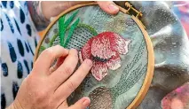  ?? MARION VAN DIJK/STUFF ?? Self-taught stitch artist extraordin­aire Fleur Woods might look like sugar and spice but she likes to embroider to hip-hop.